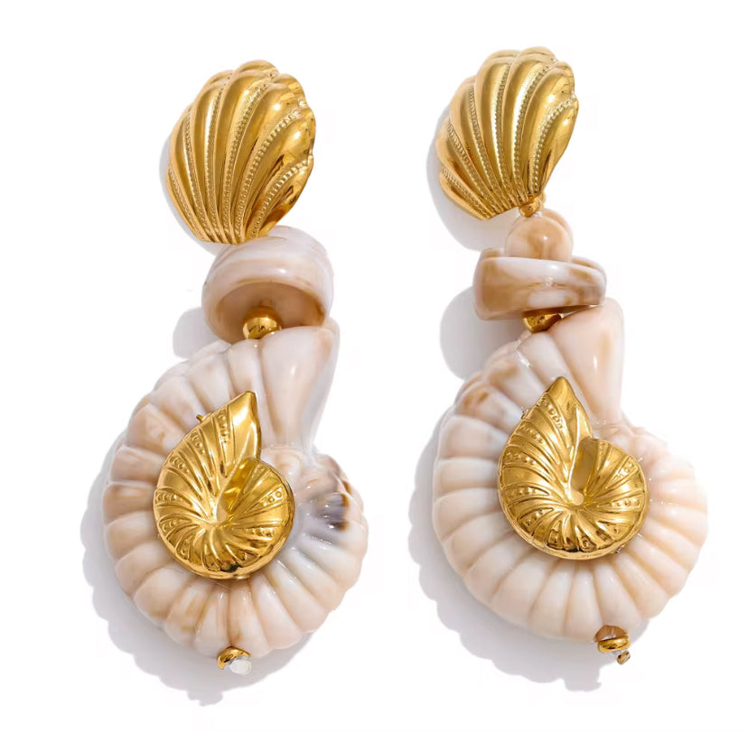 Gold scallop shell stud drop earrings with cream marbled resin nautilus pendants and gold accent detailing, displayed on white background.
